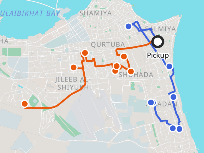 The same 14 orders split into 2 colored driver routes, both starting from the pickup location.