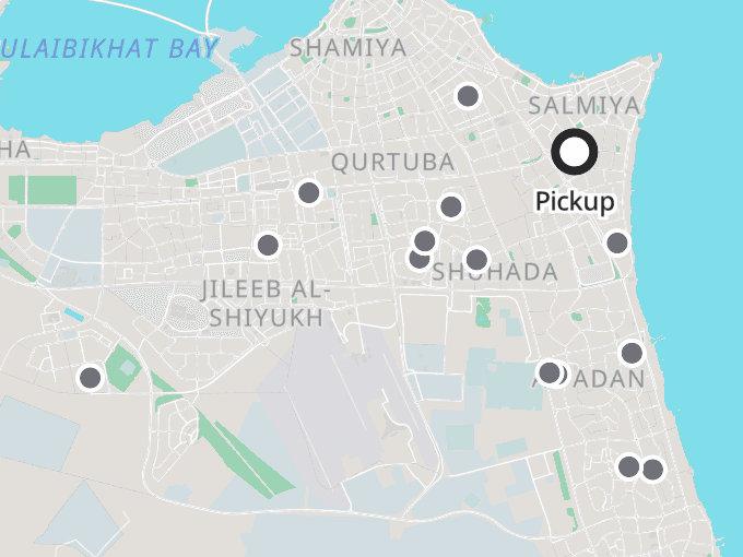 Map of Kuwait City with a pickup location and 14 orders pinned around it.
